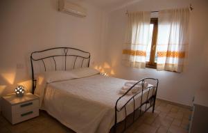 Cama ou camas em um quarto em Bados Mare