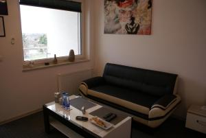 Posezení v ubytování Top Oder Apartments- private parking