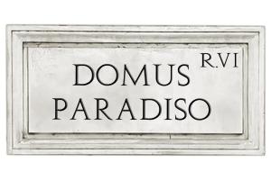 a sign with the words domus parlez parlez at Domus Paradiso City Center in Rome