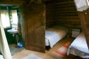 Postel nebo postele na pokoji v ubytování Vango Holiday Village