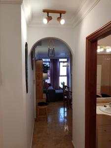 an archway leading into a room with a living room at Apartamento Hill Valley in Los Llanos de Aridane