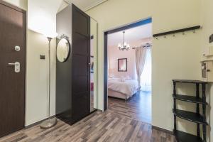 Postel nebo postele na pokoji v ubytování Athens Mini Suite