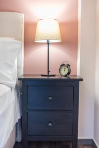 Postel nebo postele na pokoji v ubytování Athens Mini Suite