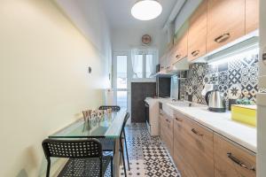 Kuchyň nebo kuchyňský kout v ubytování Athens Mini Suite