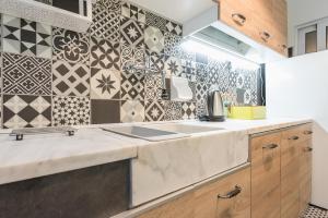 Kuchyň nebo kuchyňský kout v ubytování Athens Mini Suite