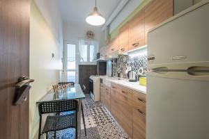 Kuchyň nebo kuchyňský kout v ubytování Athens Mini Suite