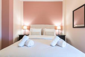Postel nebo postele na pokoji v ubytování Athens Mini Suite