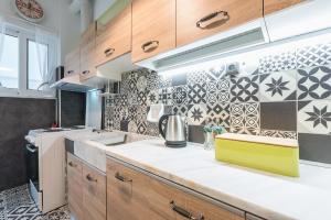 Kuchyň nebo kuchyňský kout v ubytování Athens Mini Suite + 34 fotografií