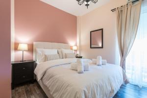 Postel nebo postele na pokoji v ubytování Athens Mini Suite