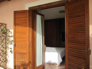 Voodi või voodid majutusasutuse Hotel Martino toas