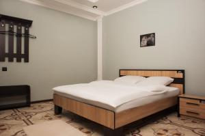 Ein Bett oder Betten in einem Zimmer der Unterkunft Sova