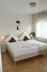เตียงในห้องที่ Ferienhaus im Nürburgring