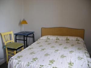 Postel nebo postele na pokoji v ubytování Hôtel Modern