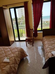 Posezení v ubytování Sanremo Hotel Restorant