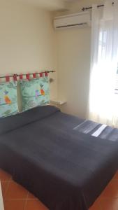 Postel nebo postele na pokoji v ubytování Casa Falcone B&B