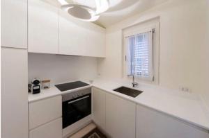 A kitchen or kitchenette at Appartamento Il Principe
