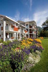 Κήπος έξω από το Residence RADIANA