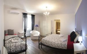 A bed or beds in a room at Ventodestate