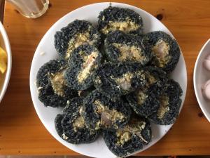 a plate of cookies on a table at Hello Mu Cang Chai Homestay & Tours in Mù Cang Chải