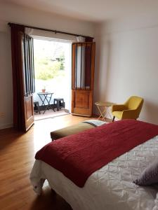 Cama ou camas em um quarto em Hostal Boutique Casa La Barca