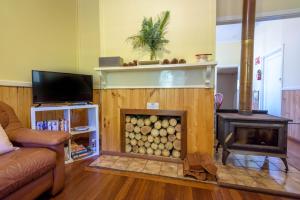 
A television and/or entertainment center at Lewana Cottages

