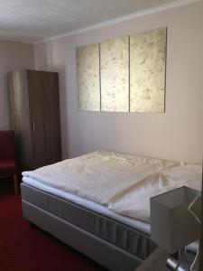Postel nebo postele na pokoji v ubytování Hotel Neptun + 15 fotografií