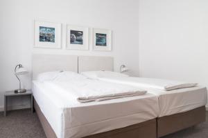 Postel nebo postele na pokoji v ubytování MAX Hotel Düsseldorf Self-Check-in