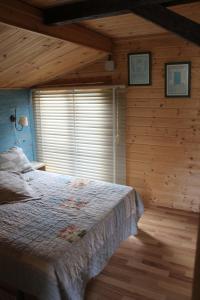 Ένα ή περισσότερα κρεβάτια σε δωμάτιο στο Camping Riba-roja