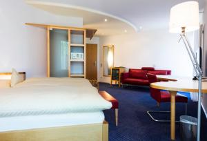Postel nebo postele na pokoji v ubytování Parkhotel Schillerhöhe + 27 fotografií