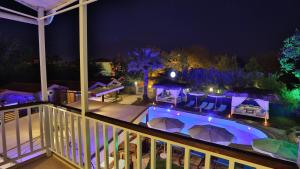 a view of a swimming pool at night at B&B Boutique Hotel in Dalyan