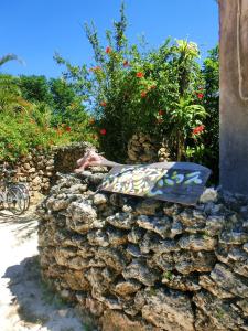 Сад в Taketomijima Guesthouse and je Taime