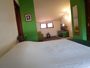 Voodi või voodid majutusasutuse B&B Books & Bikes toas