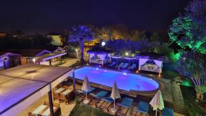 an overhead view of a swimming pool at night at B&B Boutique Hotel in Dalyan