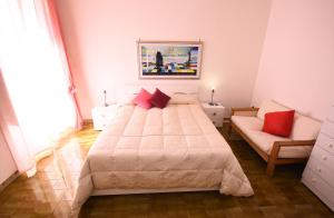 A bed or beds in a room at Villa Loriand