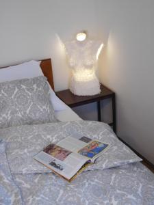 Postel nebo postele na pokoji v ubytování Hradiska