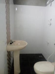 Ett badrum på Amadi Rest