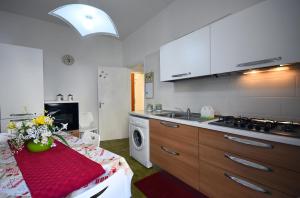 A kitchen or kitchenette at Villa Loriand