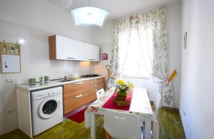 A kitchen or kitchenette at Villa Loriand