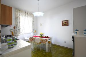 A kitchen or kitchenette at Villa Loriand