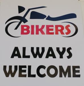 a sign that says bikers always welcome at Villa Senegačnik in Portorož