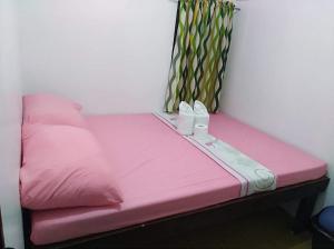Postel nebo postele na pokoji v ubytování Gaea's Apartments