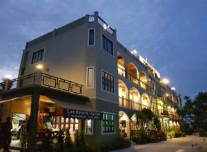 a large building with lights on top of it at Landmark Maha Sarakham in Maha Sarakham