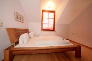 Łóżko lub łóżka w pokoju w obiekcie City Apartments Mozart