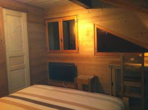 Postel nebo postele na pokoji v ubytování Chalet Narcisse