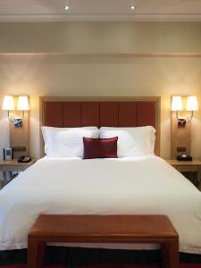 Кровать или кровати в номере Landhotel Becker