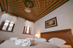 Postel nebo postele na pokoji v ubytování Hotel Kalemi 2