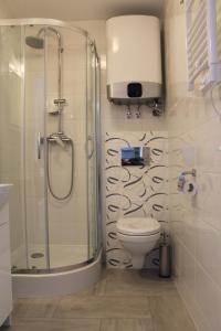 Kúpeľňa v ubytovaní Apartament "Zacisze"