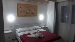 Posteľ alebo postele v izbe v ubytovaní B&B LADY JOLANDA