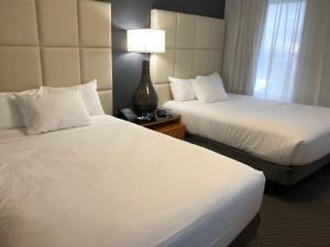 Cama ou camas em um quarto em The Streamline Hotel - Daytona Beach