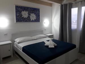 Posteľ alebo postele v izbe v ubytovaní B&B LADY JOLANDA